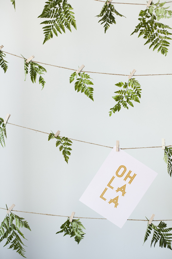 Natural photo booth backdrop made with leaves