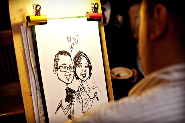 Caricature artist drawing couple at dinner and dance