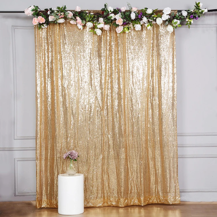 Golden Backdrop with flowers hung DIY for photobooth photoshoot for wedding event